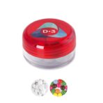 Round plastic container with mints or sweets